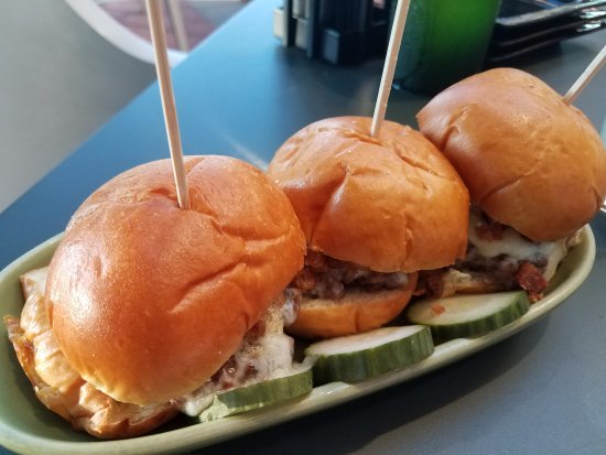 Divvy signature dishes Spanish Burger Slider
Blistered Brussels Sprouts
Hot Fried Duck Baos